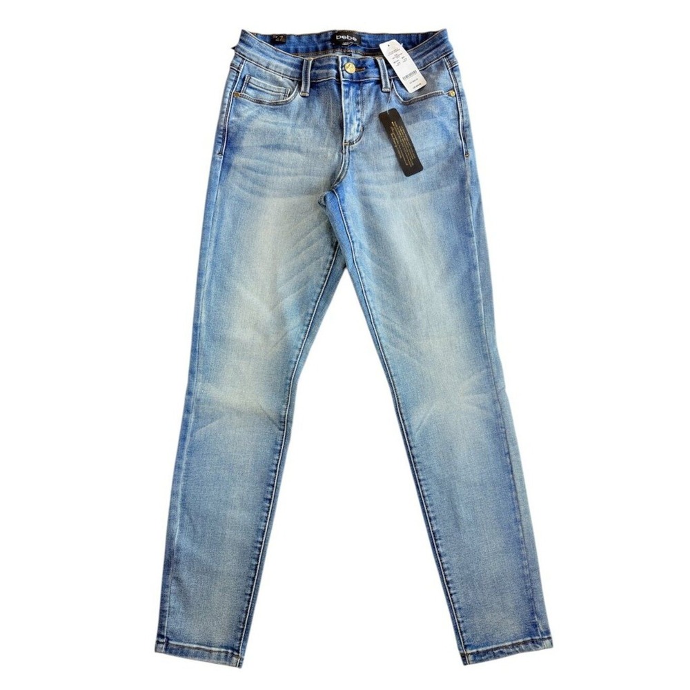 NWT bebe The Flirt Skinny Light Wash Faded Denim Jeans Size 27